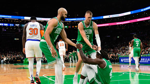 jrue holiday kristaps porzingis derrick white boston celtics